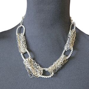 Unique silver with a hint of gold chain linking adjustable necklace
